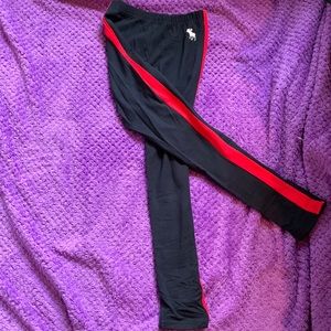 Blue leggings with red stripe